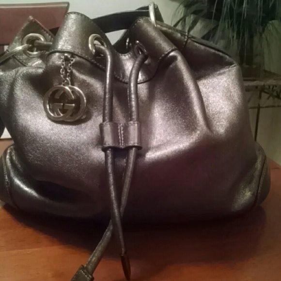 Gucci Handbags - Gucci Metallic drawstring handbag